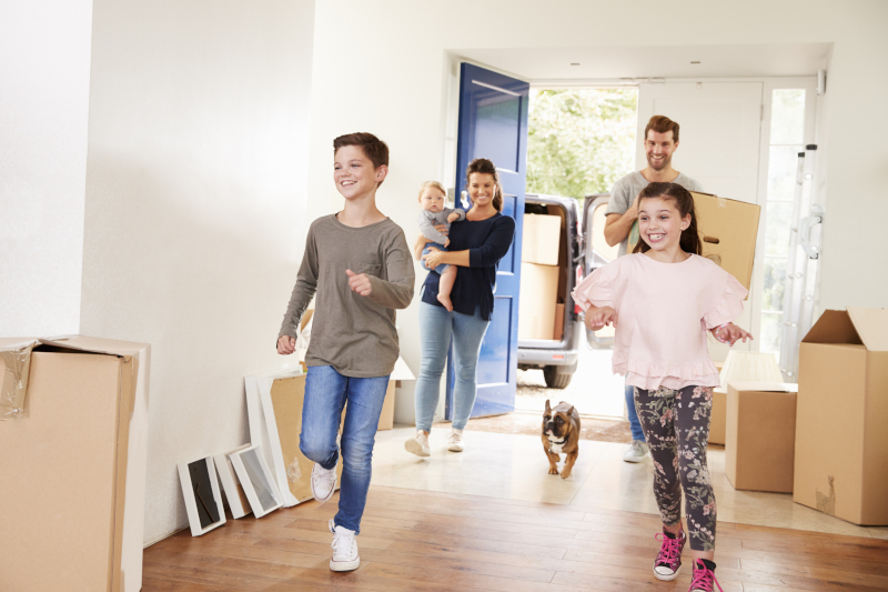 A family moving into their new home